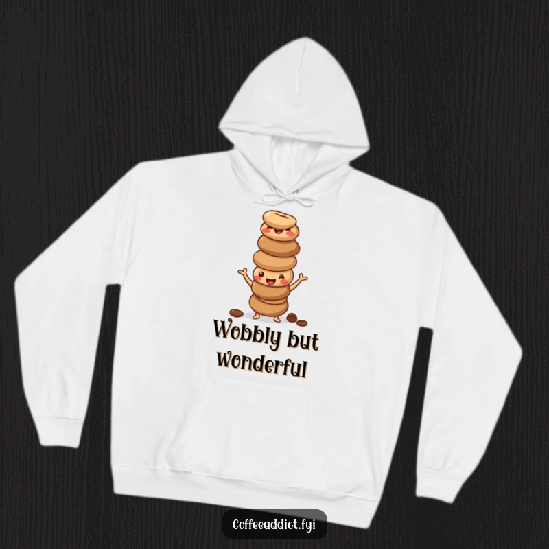 Funny hoodie depicting a stack of happy, wobbling coffee beans in a silly, unbalanced pose, perfect for coffee lovers.