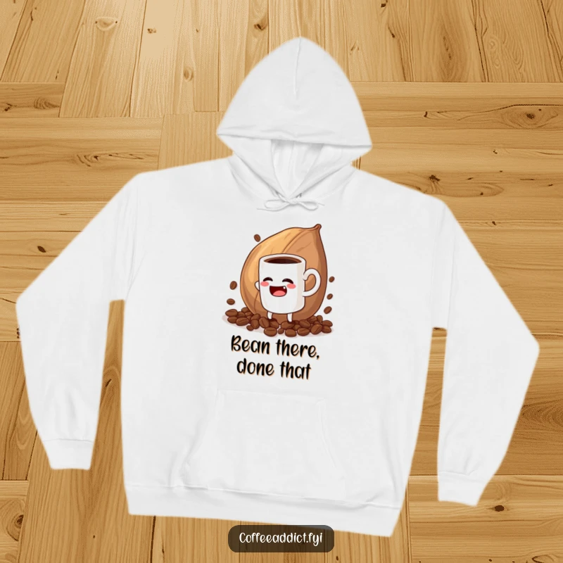 Funny hoodie print of a mug character pretending to battle a gigantic coffee bean, showcasing relatable coffee humor.