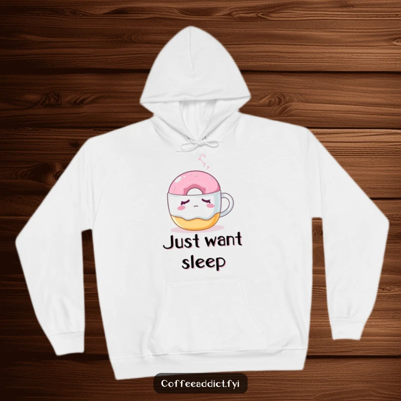 Funny hoodie showing a sleepy donut gently nudged by a steaming coffee mug, ideal for cozy, cute wear.