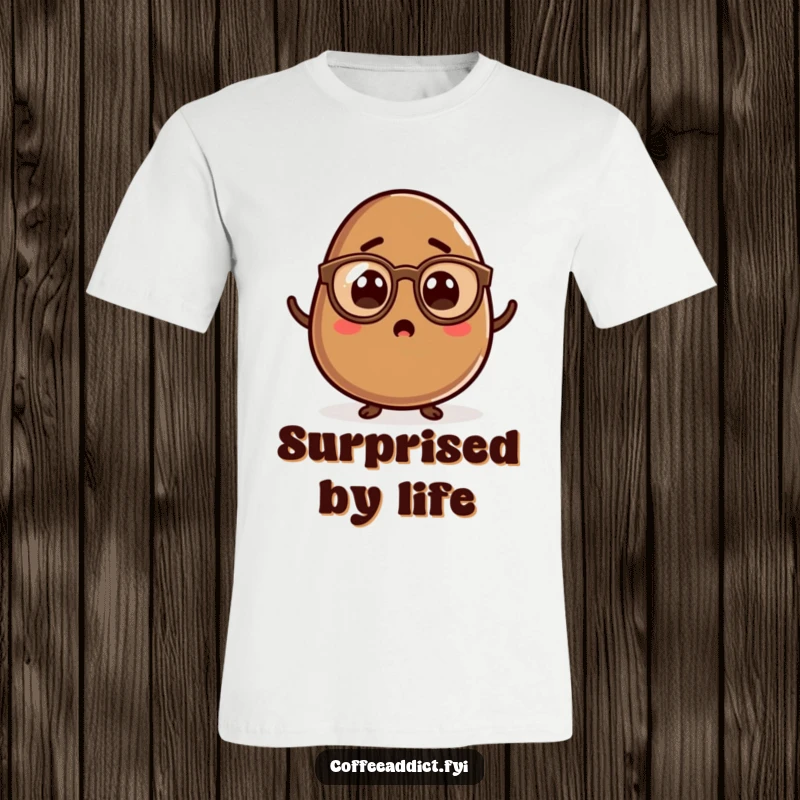 Funny Kawaii Coffee Bean T-Shirt showing a small bean character wearing spectacles and looking surprised, embodying curiosity and humor.