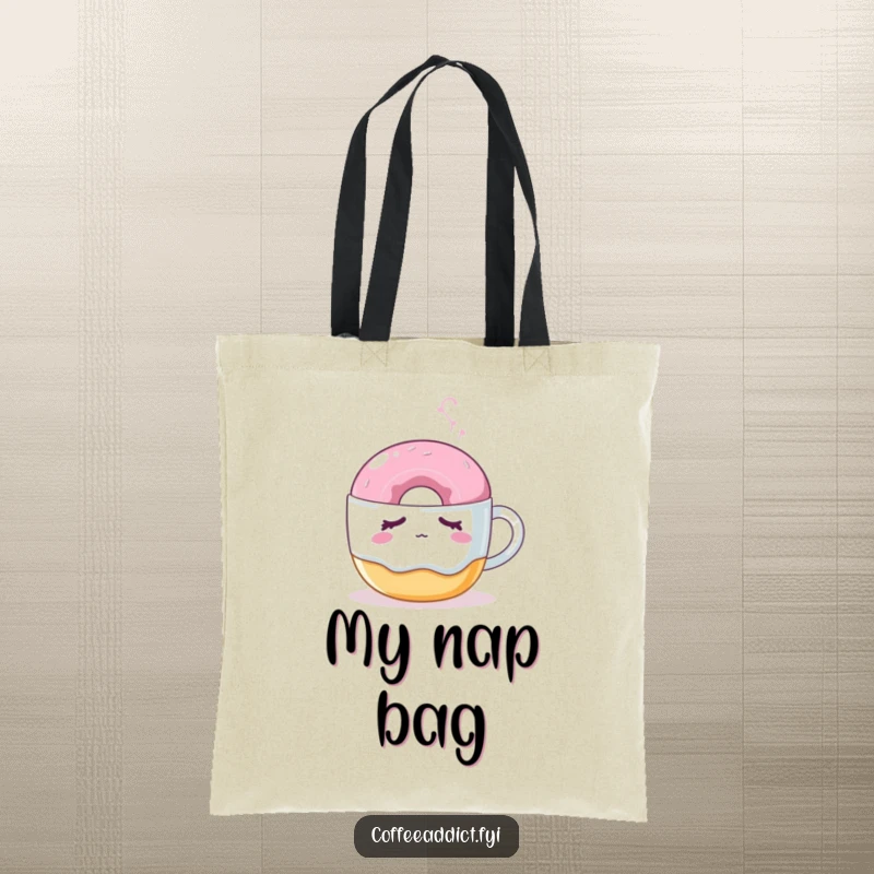 Funny tote bag featuring a sleepy donut nudged by a steaming coffee mug, perfect for carrying essentials stylishly.